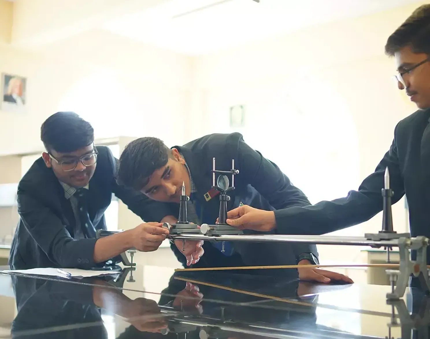 Students engaged in interactive classroom learning with teachers at Sarala Birla Academy